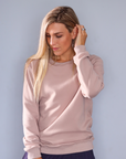 Fit women wearing grey women's crew sweatshirt