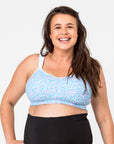 happy pregnant woman wearing her a supportive nursing bra